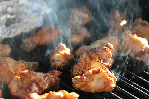 Fire up the grill on game day- if you prepare this Huli Huli Chicken Wings recipe it won’t matter if your teams wins or loses your guests will love you for putting this one on the table. The chicken is marinated in soy sauce and garlic, and then grilled with a touch of Hickory smoke, and served with a spicy Hawaiian sauce. Just be sure you allow enough time to marinade the chicken. (I marinated mine for about 6 hours and that seem to work out fine) Just be sure to have the wet naps handy when you serve these gooey and delicious Huli Huli Chicken Wings. Enjoy